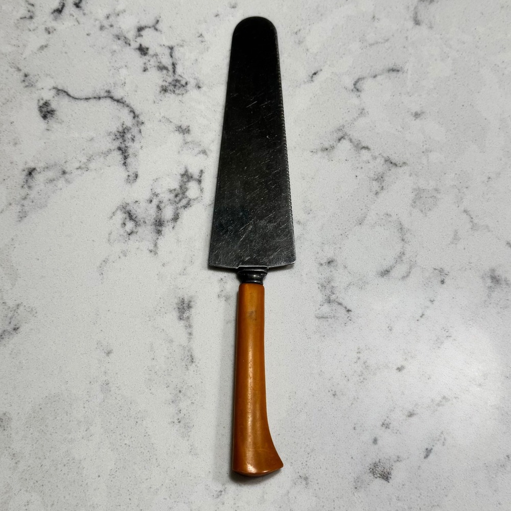 Vintage Cake Knife Pie Server Yellow Orange Bakelite‎ Handle Serrated Edge
10"